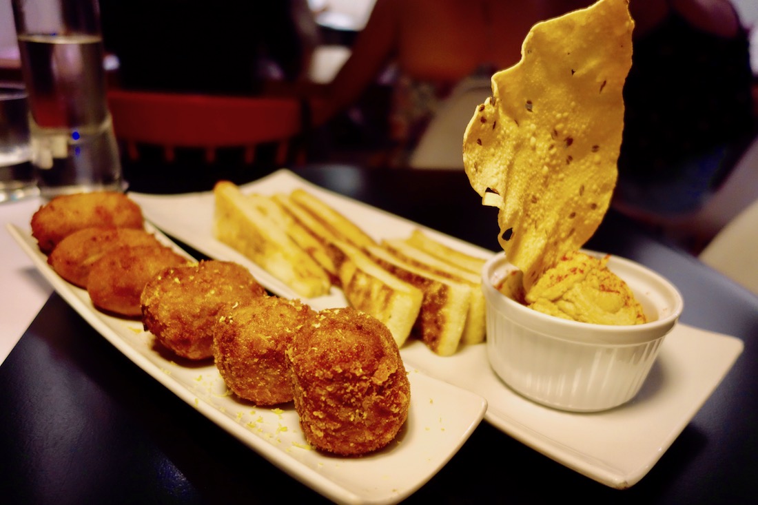 Potato balls, hummus, and bread at Copenhagen Restaurant in Valencia, Spain - Best restaurants in Valencia Spain | https://egypt-visit.biz