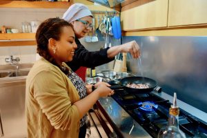 Dining with locals is an amazing foodie experience to do while traveling! Click to read my EatWith review for everything you need to know about EatWith.